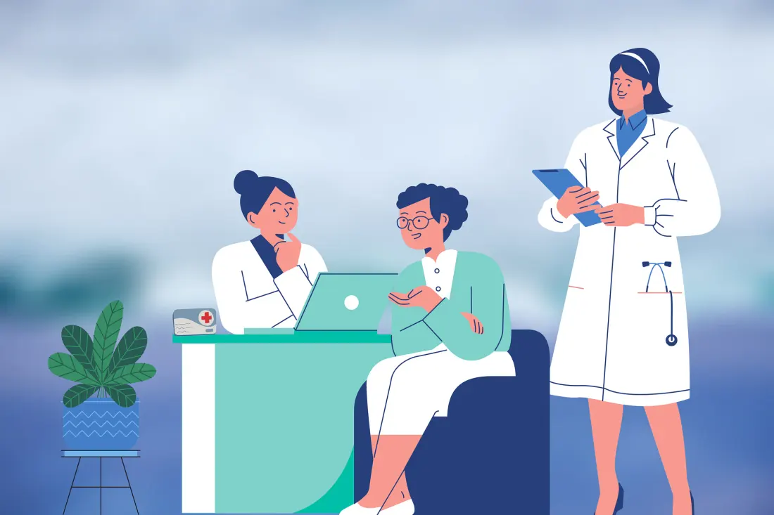 Team sanitario che lavora al gestionale ADI su un portatile